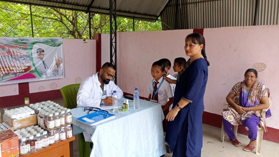 Students undergoing check up at the medical camp.